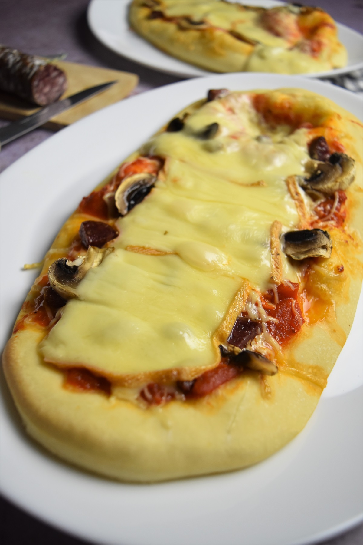 Pizza au fromage à raclette