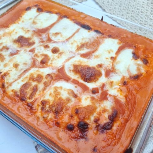 Quenelles au gratin, sauce tomate et fromage