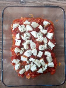 Mettre la mozzarella et saupoudrer d'origan