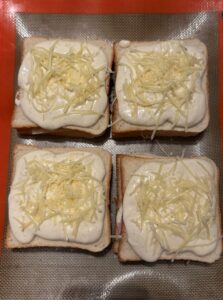 Répartir béchamel et comté