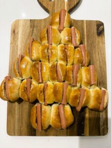 mettre les saucisses dans les pains